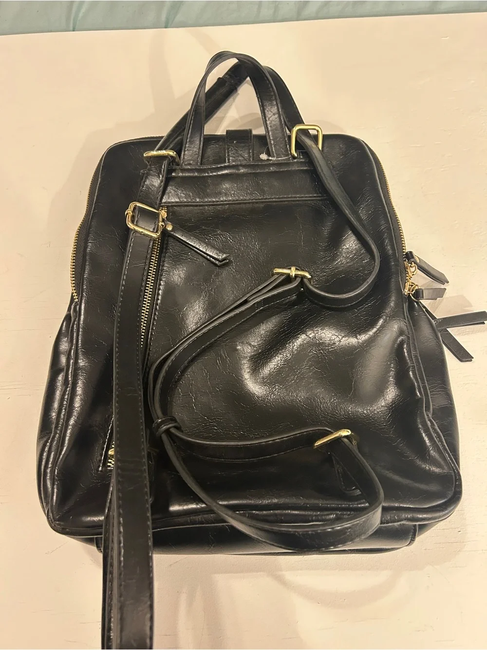 antik kraft black leather convertible backpack Nyra Webbing Strap Purse Crafted from vegan leather of the utmost quality Antik Kraft Black Vegan Leather